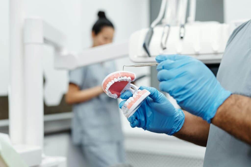 Clear Invisalign aligners shown for orthodontic treatment at AQUA Dent Clinics, Jeddah